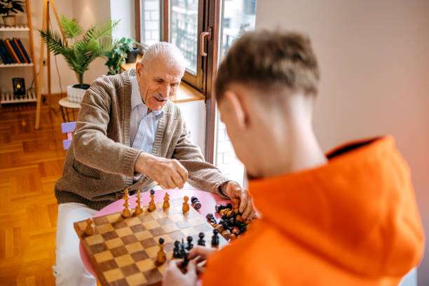 Black and white chess pieces on chess board.